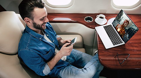 Man watching movie on plane