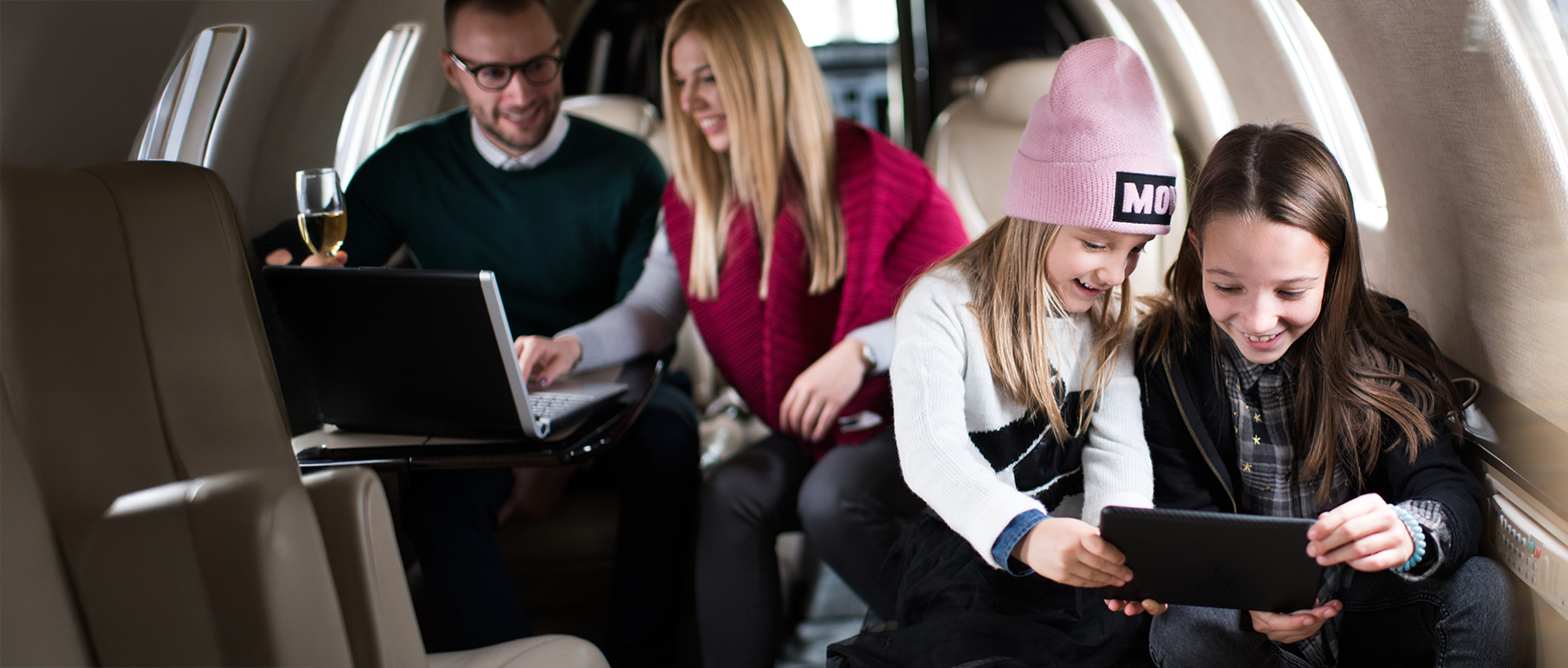 Family watching tv in cabin