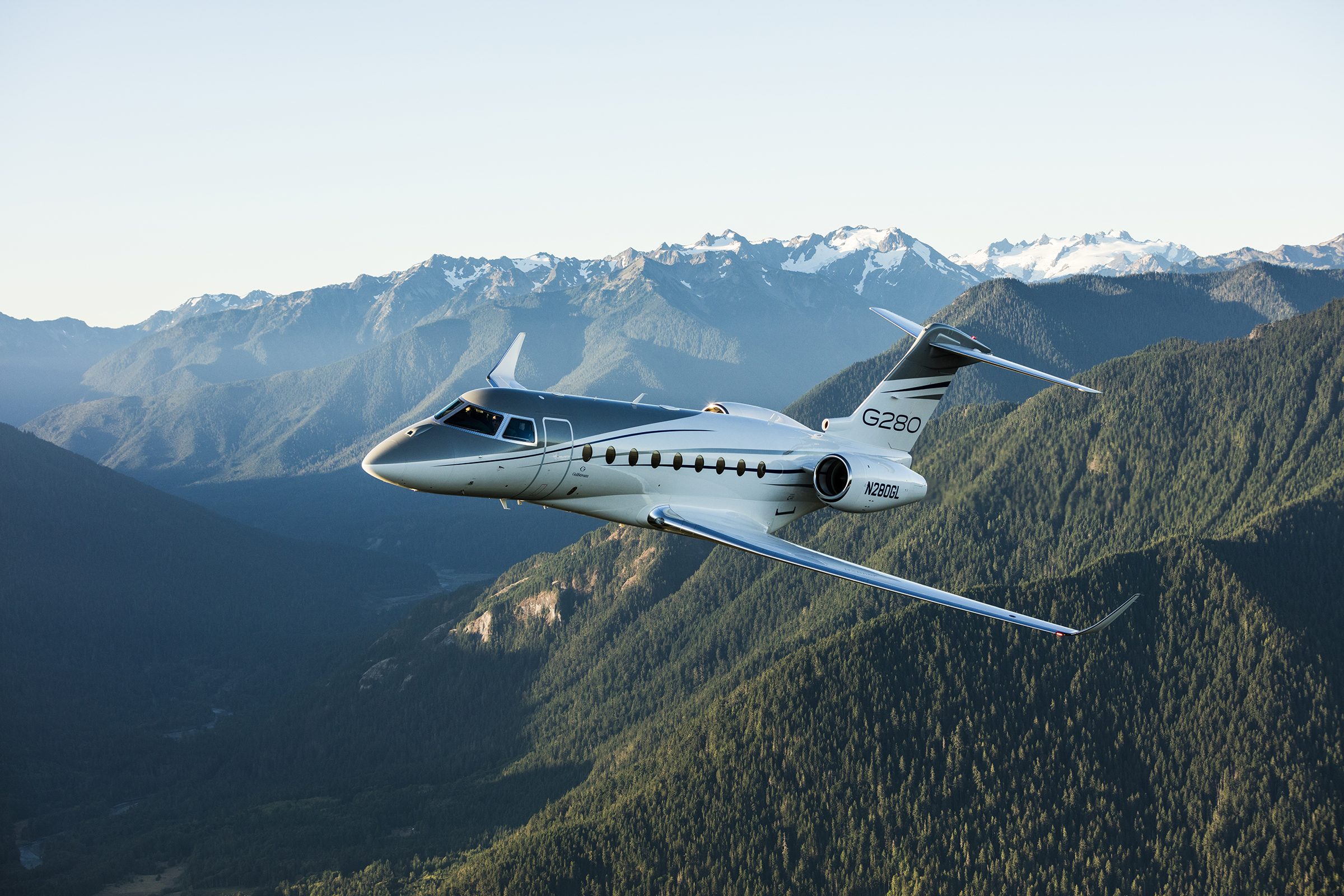gulfstream g280 flying over mountains