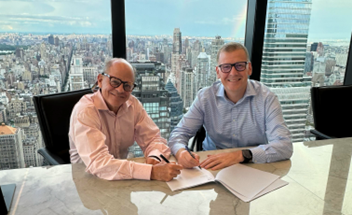 oakleigh thorne and chris moore signing agreement